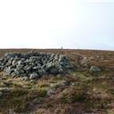 The summit shelter and trig point.